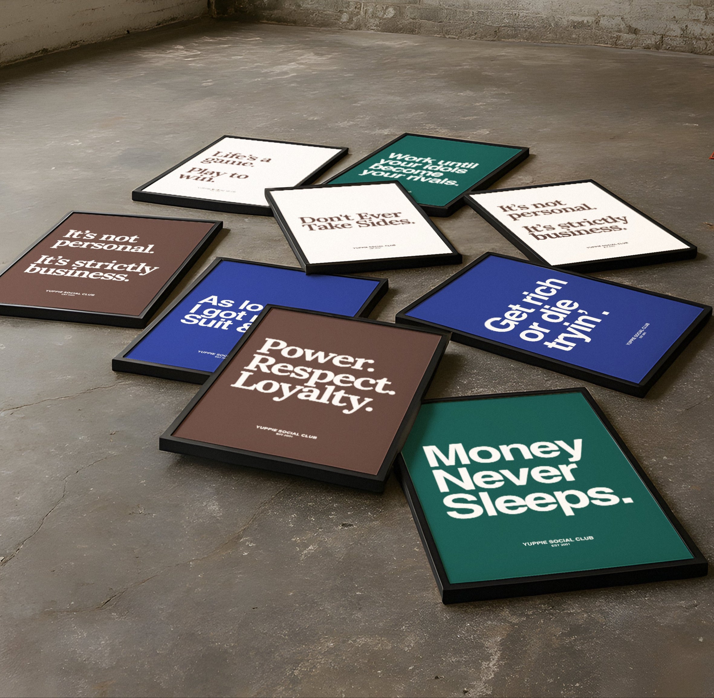 Quotes Poster with motivational phrases scattered on a concrete floor in an industrial setting.